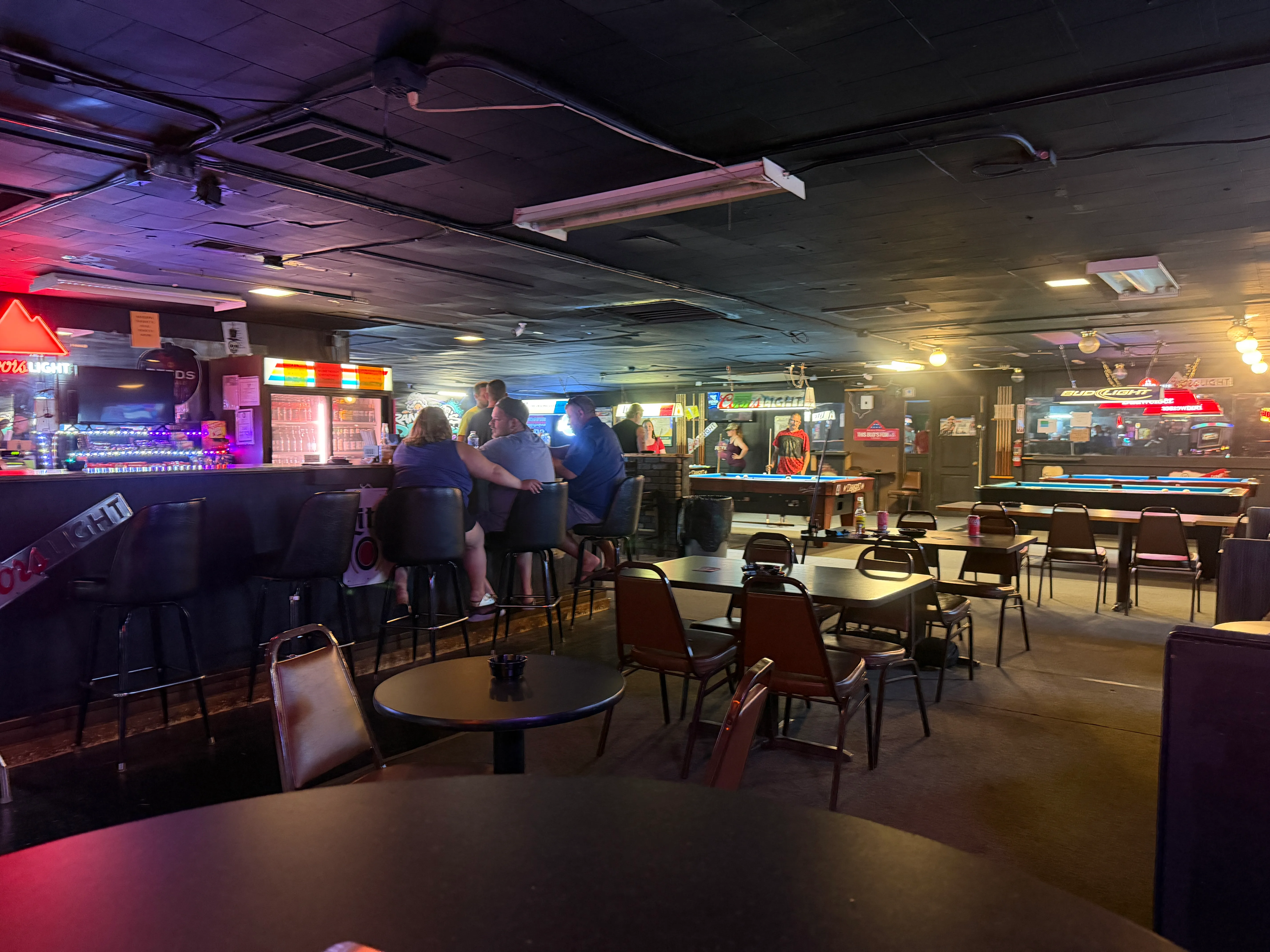 Deep Pocket Dave's bar and seating area with LED ambient lighting