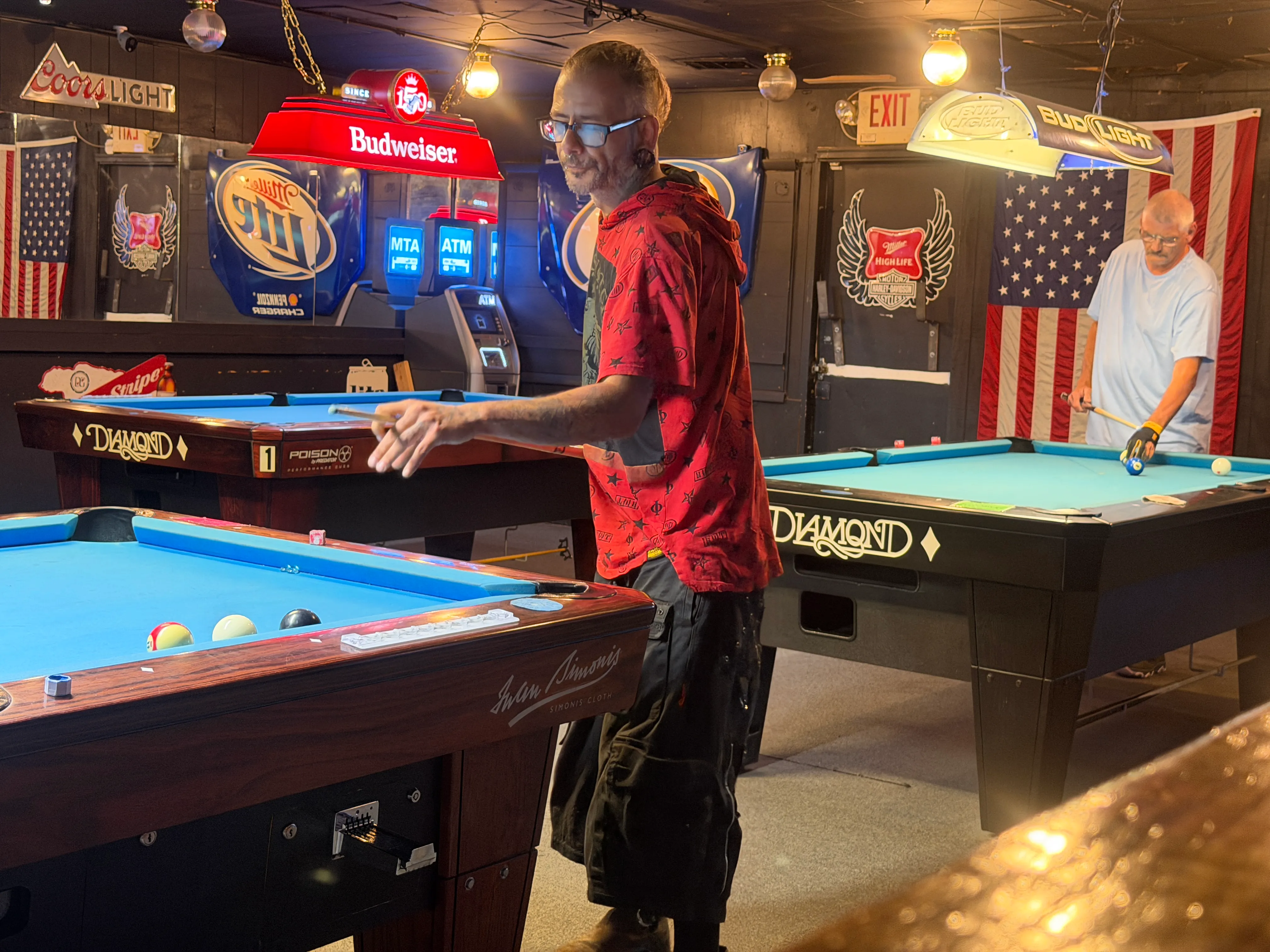 Casual players enjoying a game at Deep Pocket Dave's