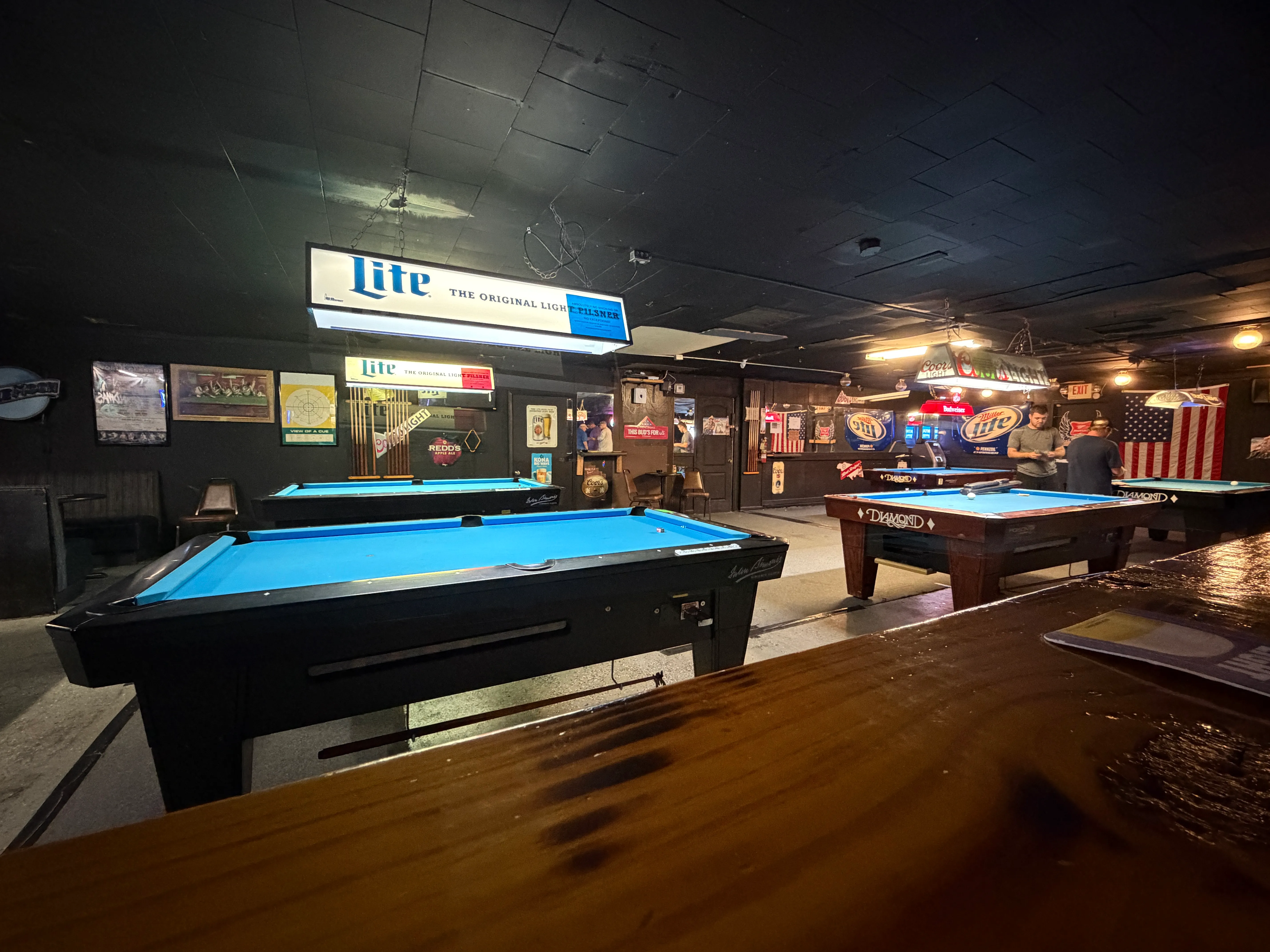 The main pool room at Deep Pocket Dave's, tables open for play