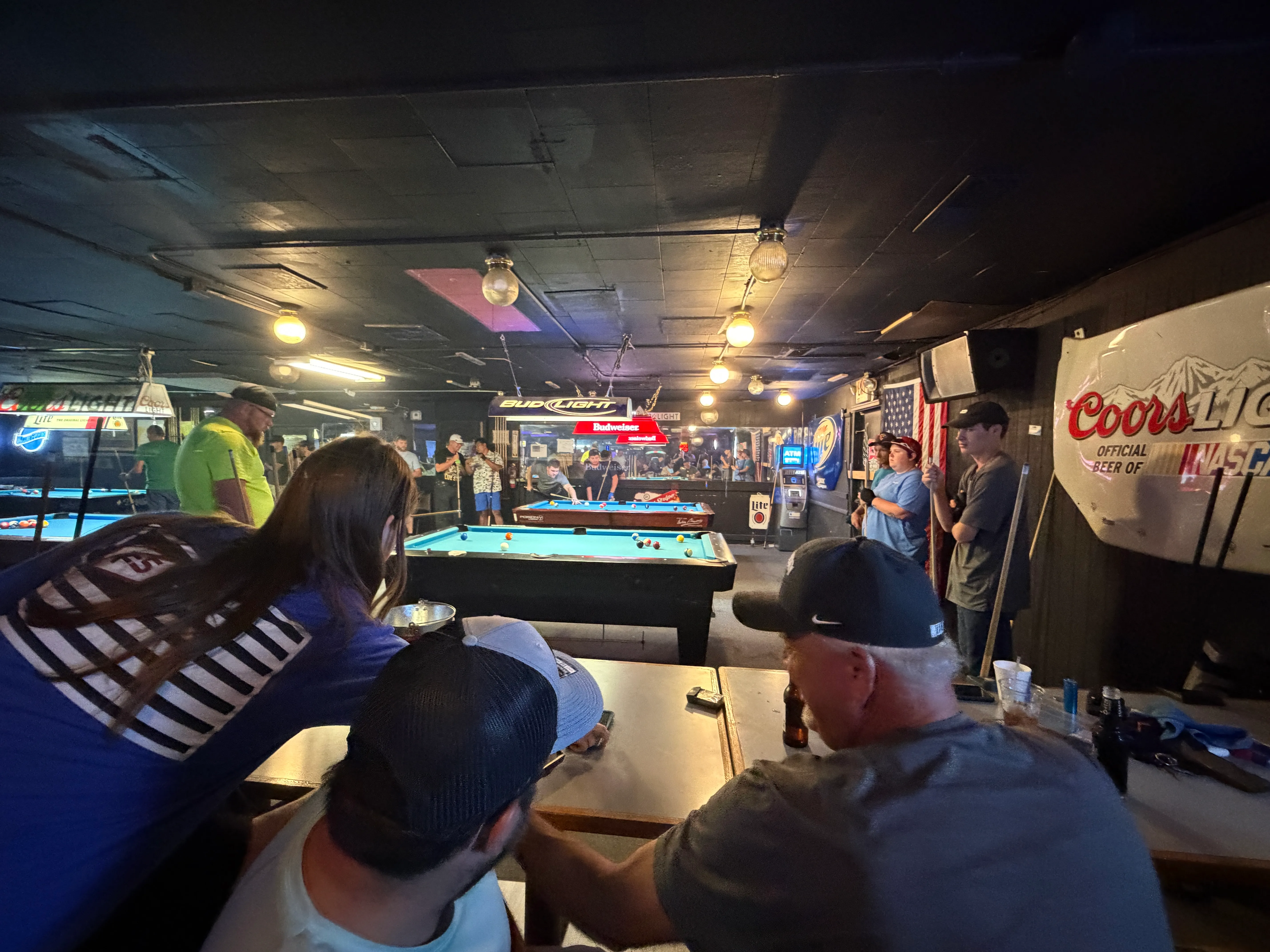 Players watching a tournament match